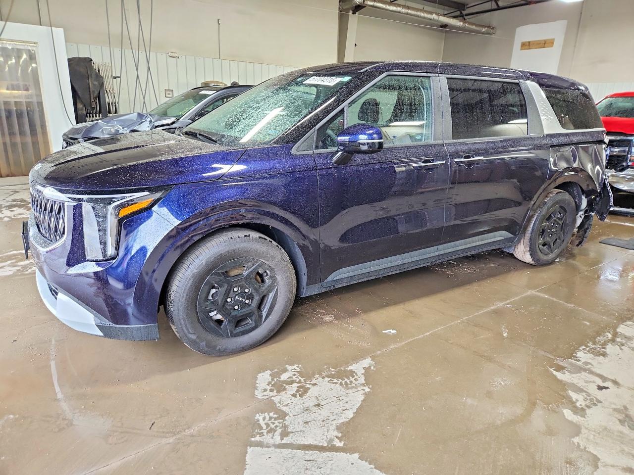 2026 Kia Carnival LXS, VIN KNDNB5K3XT6573056 — Rear end