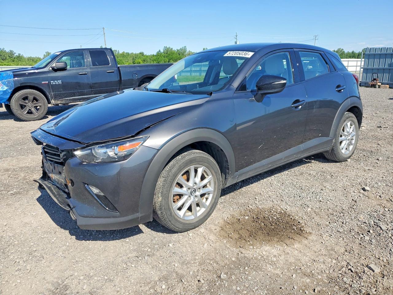 2021 Mazda CX-3 Touring, VIN JM1DKFC74M1501898 — Front end