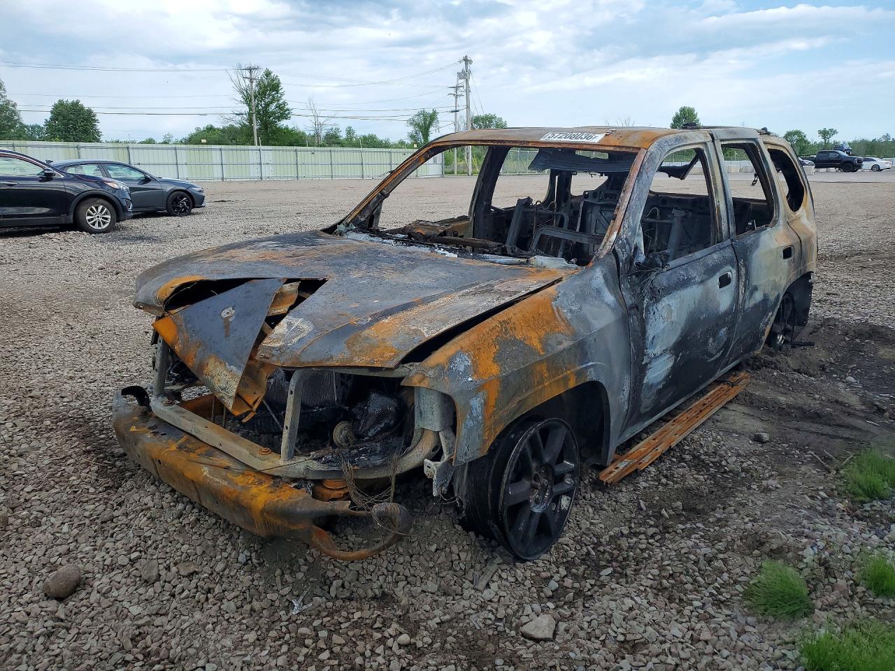 2006 GMC Envoy Denali, VIN 1GKET63M862215271 — Burn