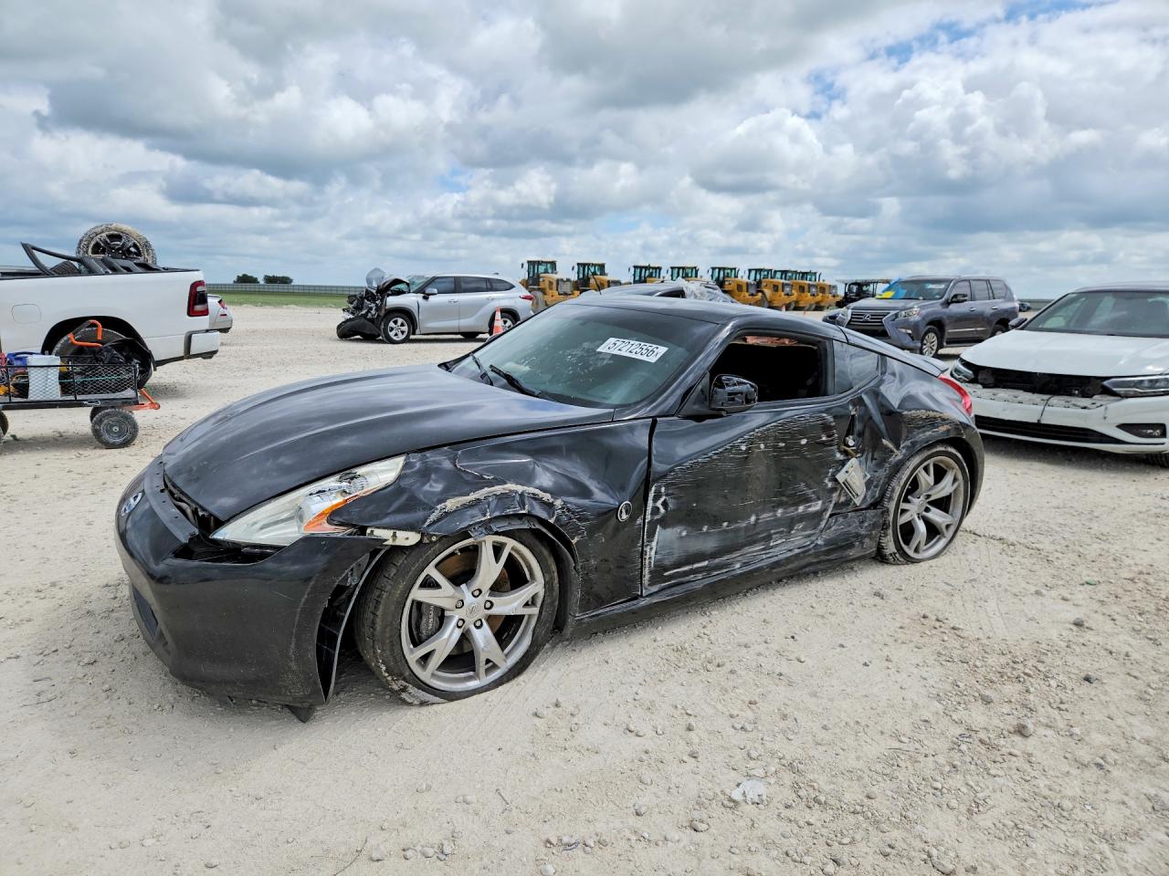 2009 Nissan 370Z Touring, VIN JN1AZ44E79M405997 — Side