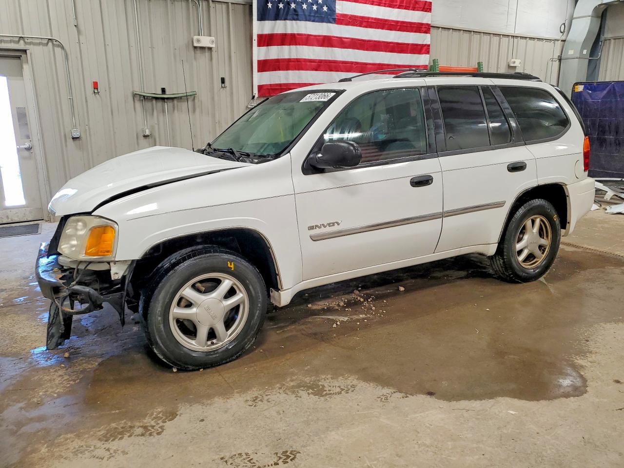 2006 GMC Envoy SLE, VIN 1GKDT13S062347518 — Front end