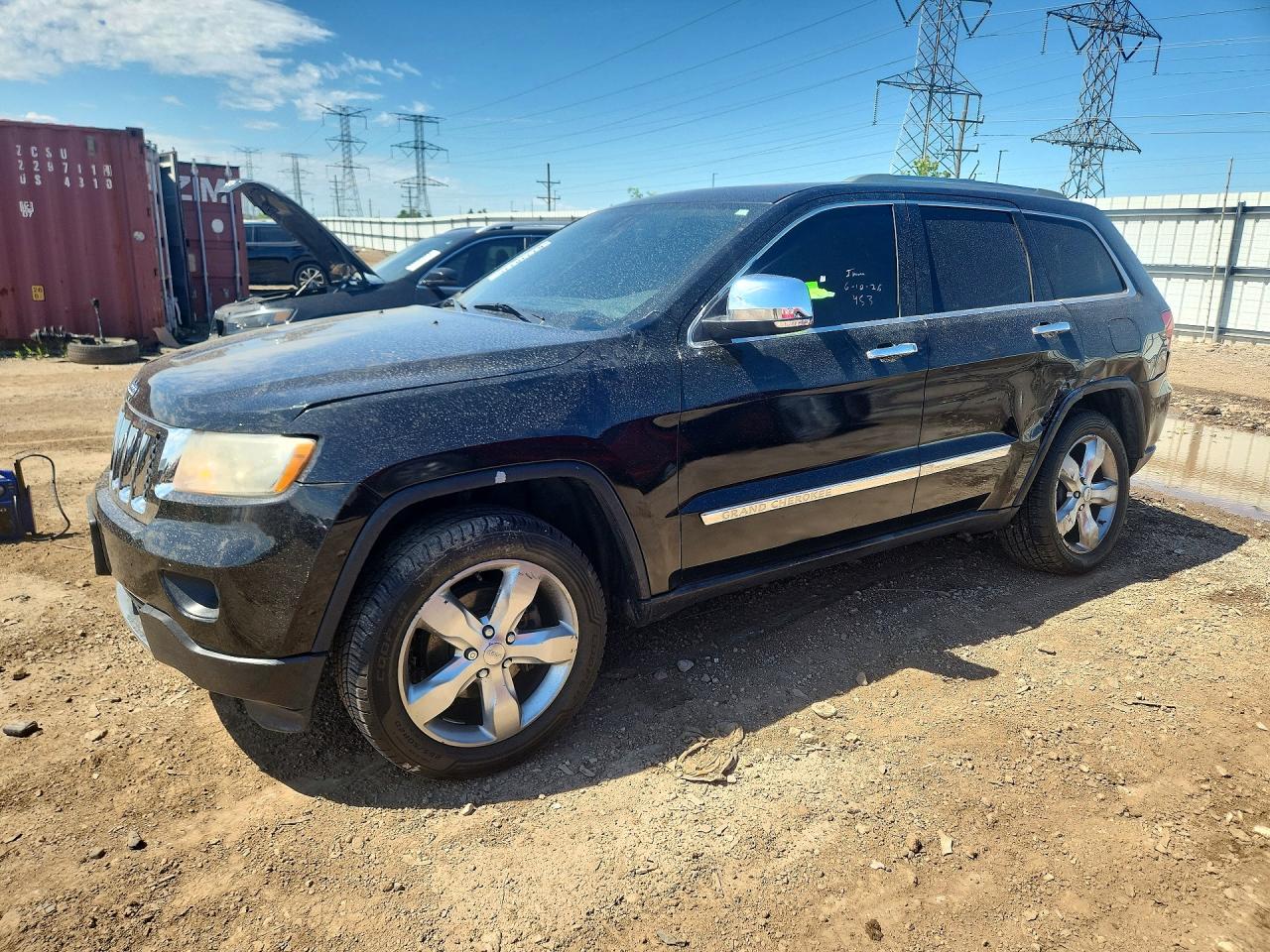 2012 Jeep Grand Cherokee Overland, VIN 1C4RJFCG3CC154544 — Undercarriage
