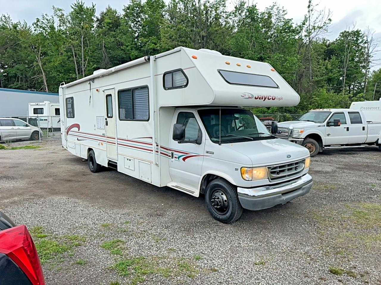 1998 Ford Econoline, VIN 1FDXE40S3WHA14232 — Minor dents and scratches
