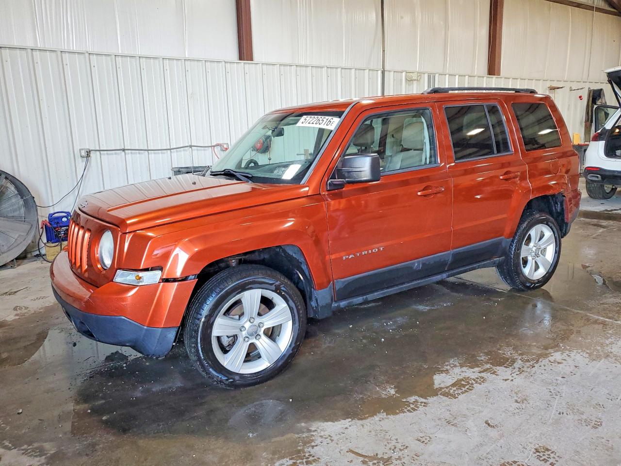 2012 Jeep Patriot Latitude, VIN 1C4NJRFB2CD589209 — Front end
