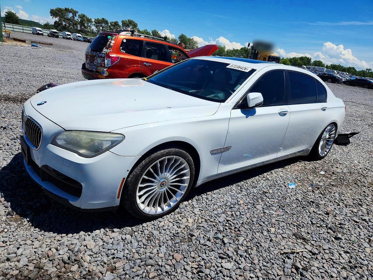 2013 BMW 7 Series 750Li, VIN WBAYE8C56DD132363 — Rear end