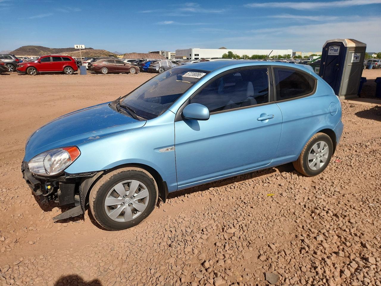 2010 Hyundai Accent GS, VIN KMHCM3AC1AU180431 — Side