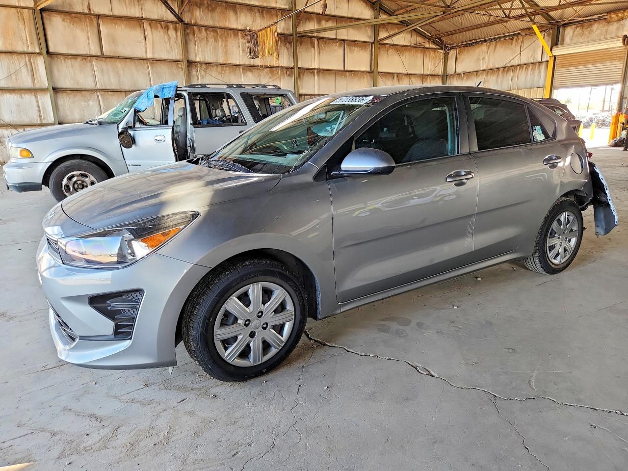 2023 Kia Rio S, VIN 3KPA24AD7PE567721 — Rear end