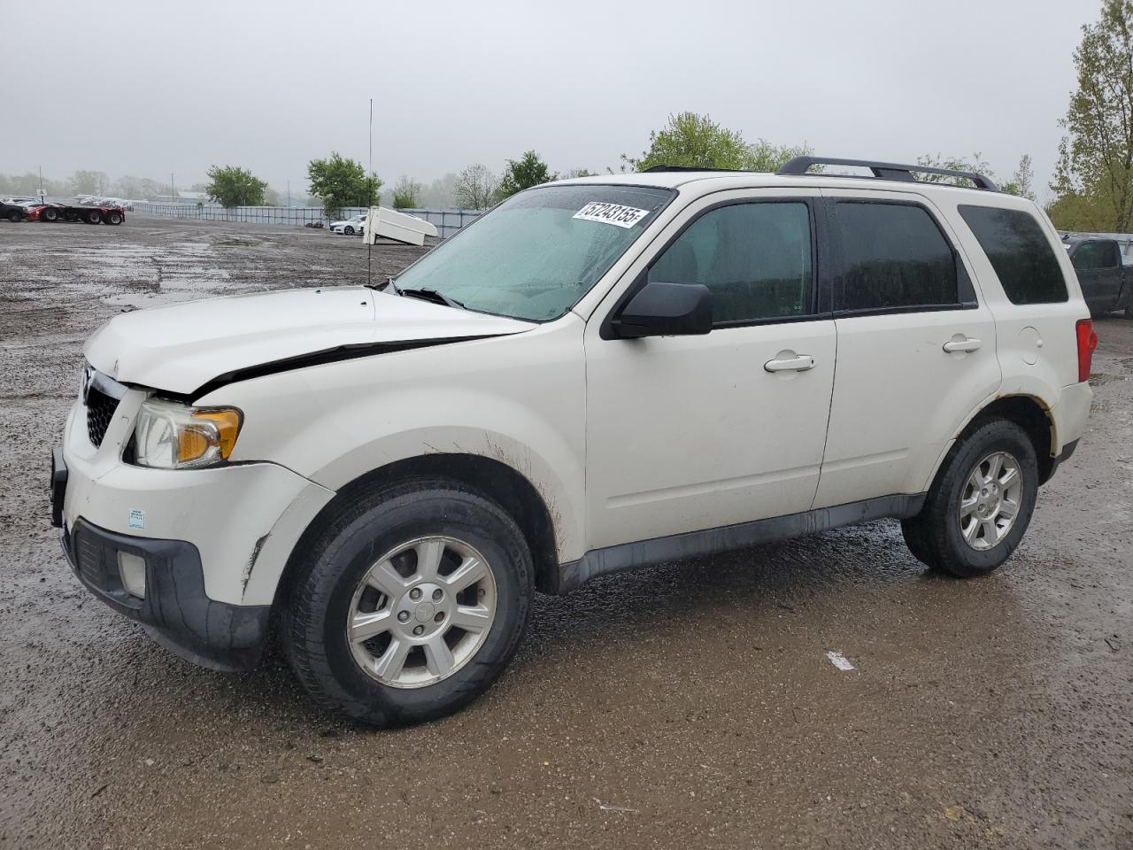 2009 Mazda Tribute Touring, VIN 4F2CZ92729KM05277 — Front end