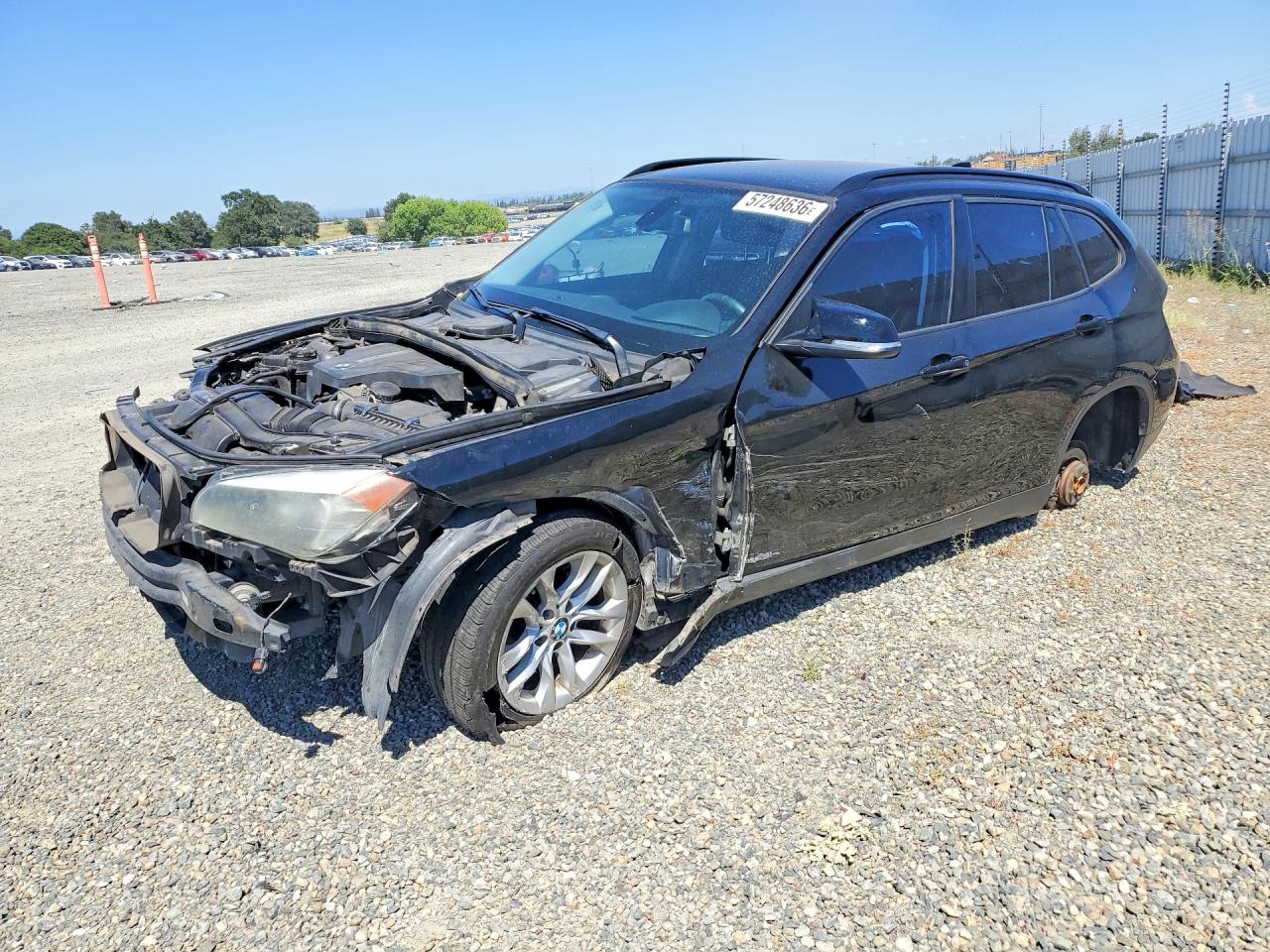 2015 BMW X1 xDrive28i, VIN WBAVL1C57FVY30039 — Front end