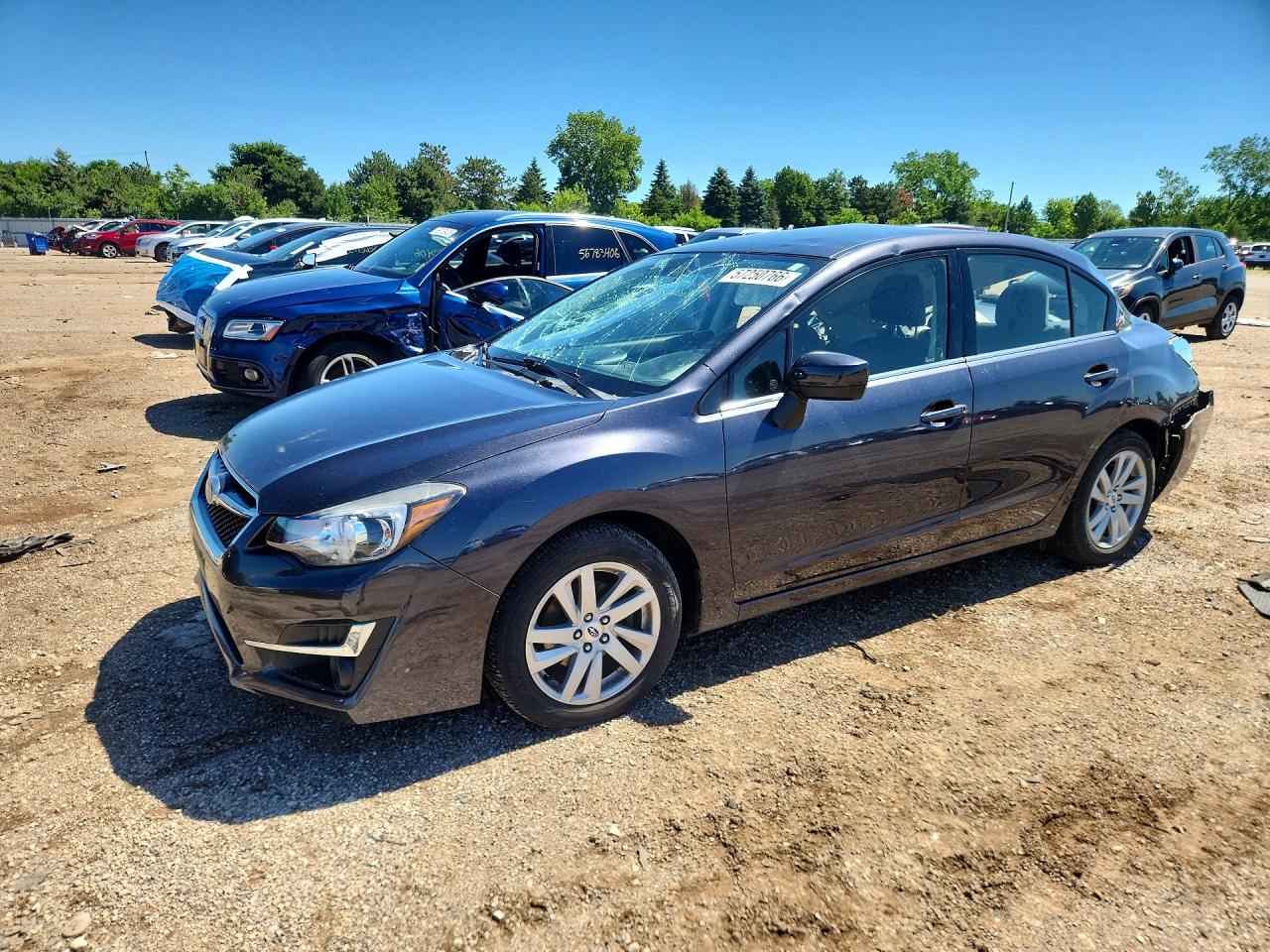 2016 Subaru Impreza Premium, VIN JF1GJAB68GH020369 — Зад