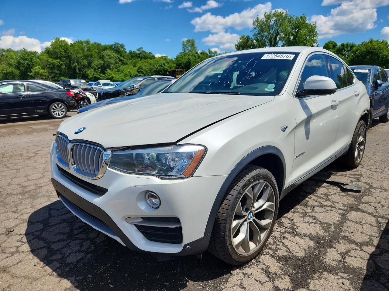 2018 BMW X4 xDrive28i, VIN 5UXXW3C5XJ0Z59850 — Зад