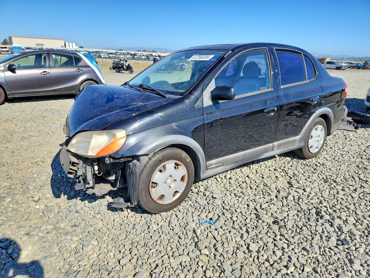 2001 Toyota ECHO, VIN JTDBT123810142837 — Перед