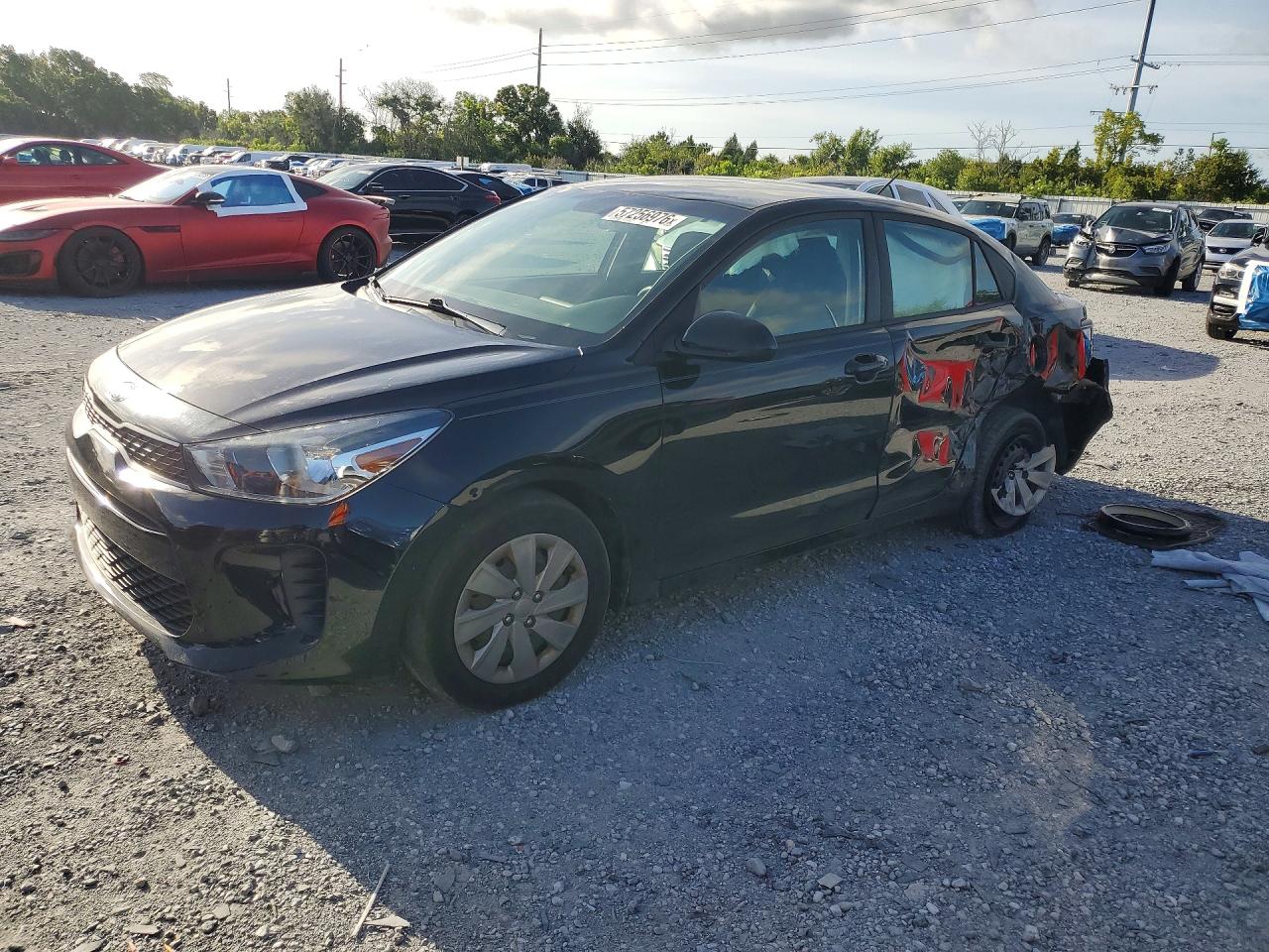 2019 Kia Rio LX, VIN 3KPA24AB6KE247717 — Бок