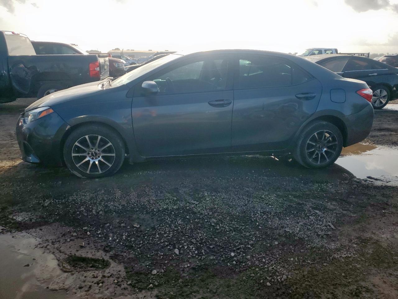 2014 Toyota Corolla S Plus, VIN 5YFBURHE3EP169587 — Side