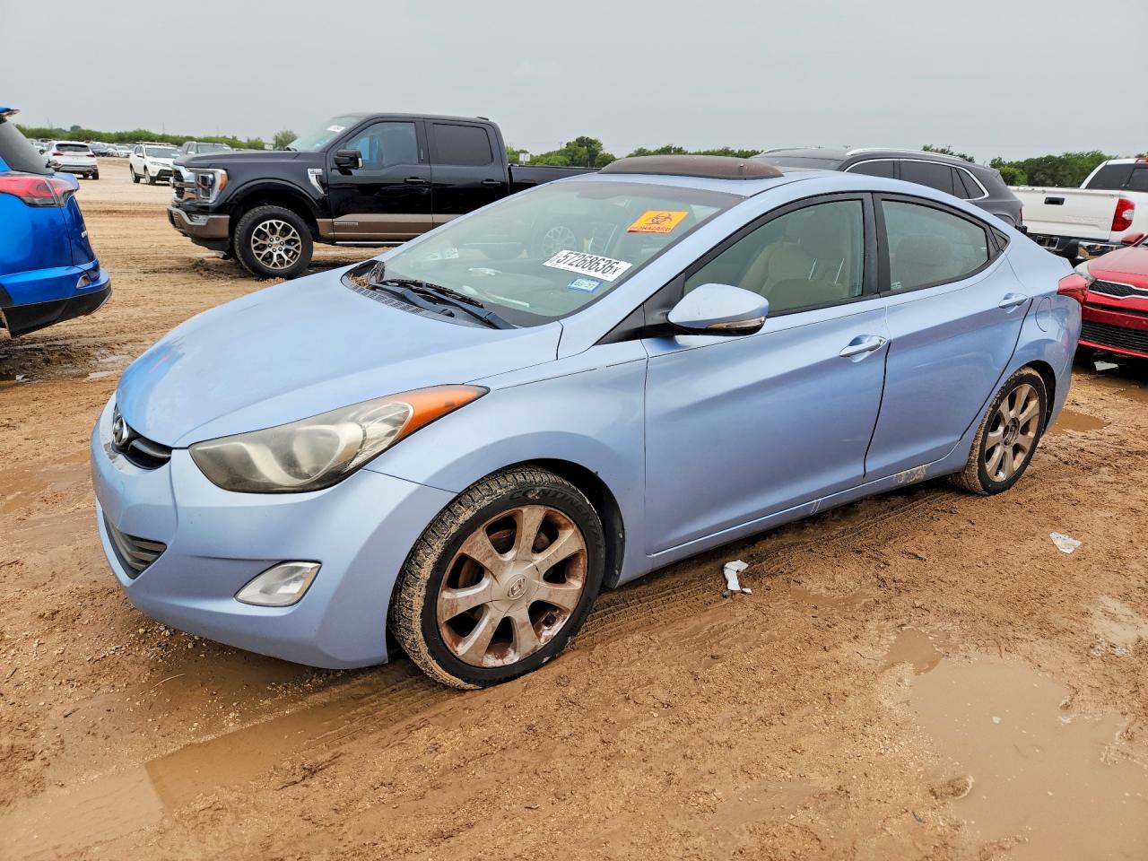 2012 Hyundai Elantra Limited, VIN KMHDH4AE1CU492302 — Vandalism