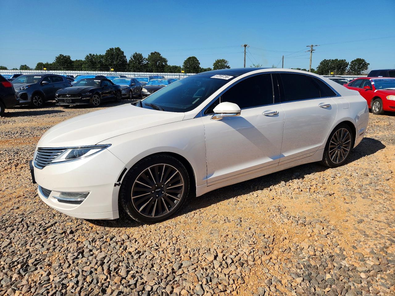 2015 Lincoln MKZ, VIN 3LN6L2J99FR615709 — Hail