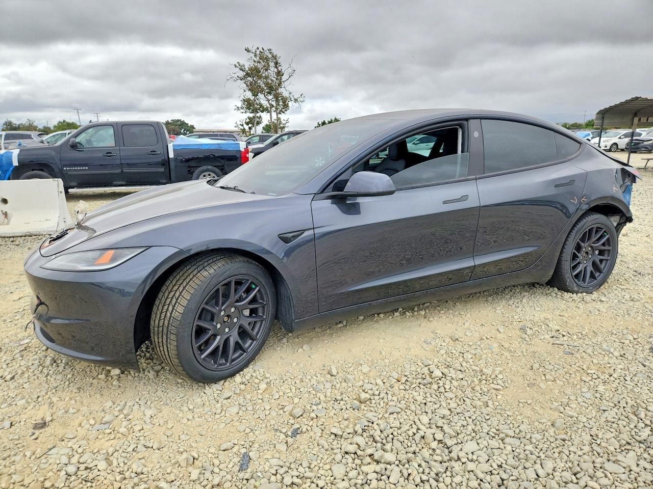 2024 Tesla Model 3 Long Range, VIN 5YJ3E1EB1RF736989 — Rear end