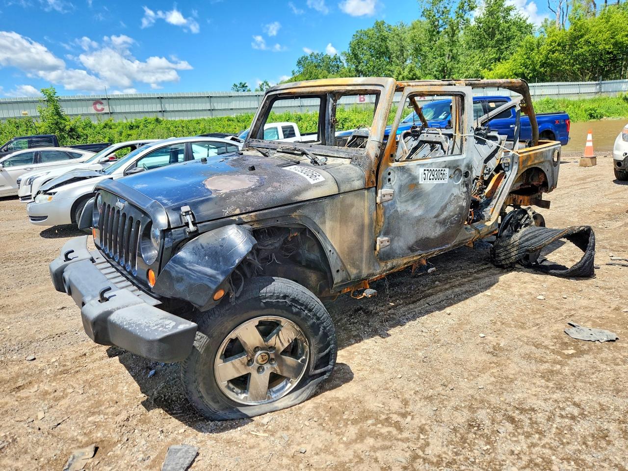 2008 Jeep Wrangler Unlimited Sahara, VIN 1J4GA591X8L503866 — Burn