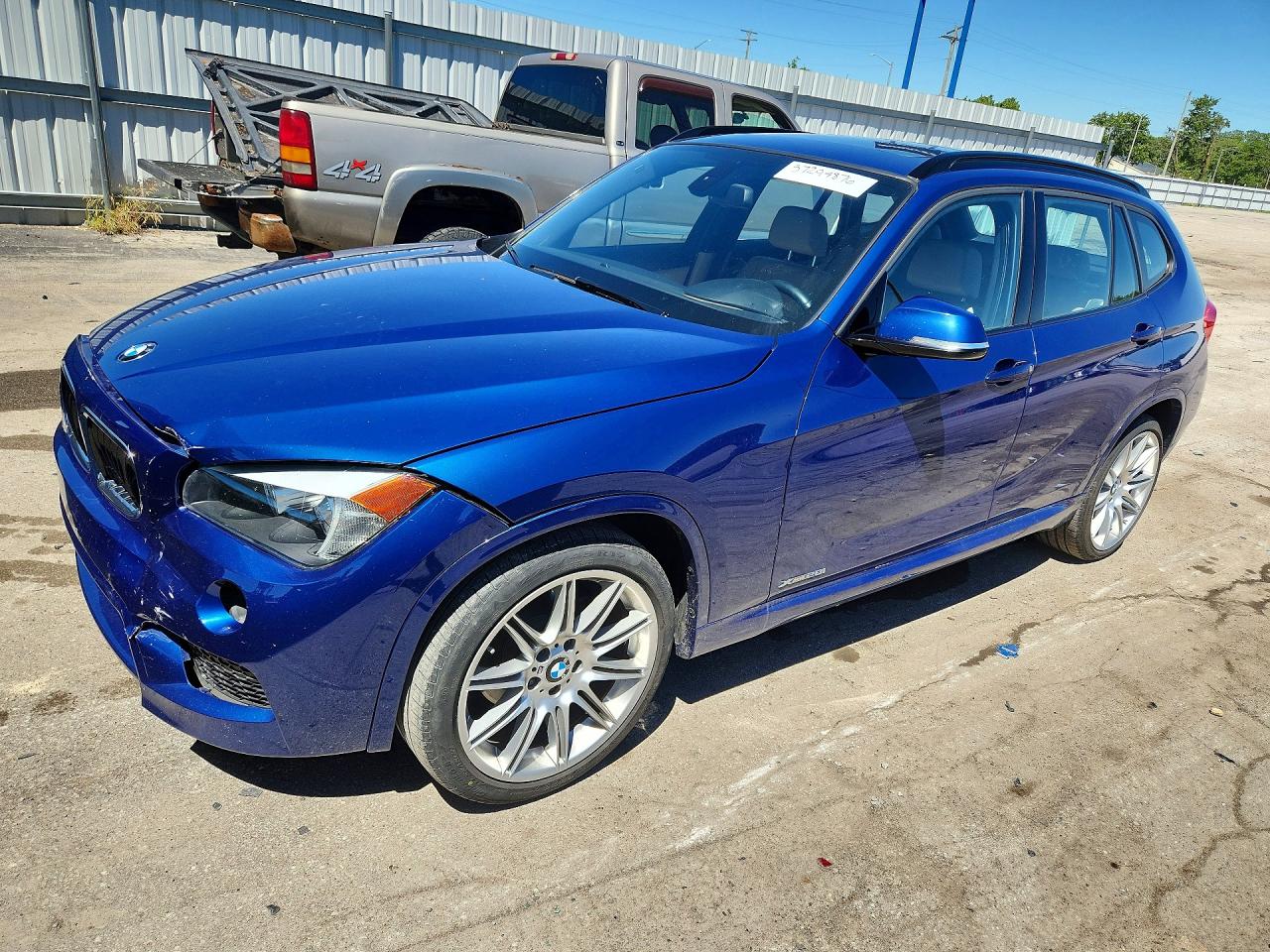 2013 BMW X1 xDrive28i, VIN WBAVL1C56DVR82715 — Front end