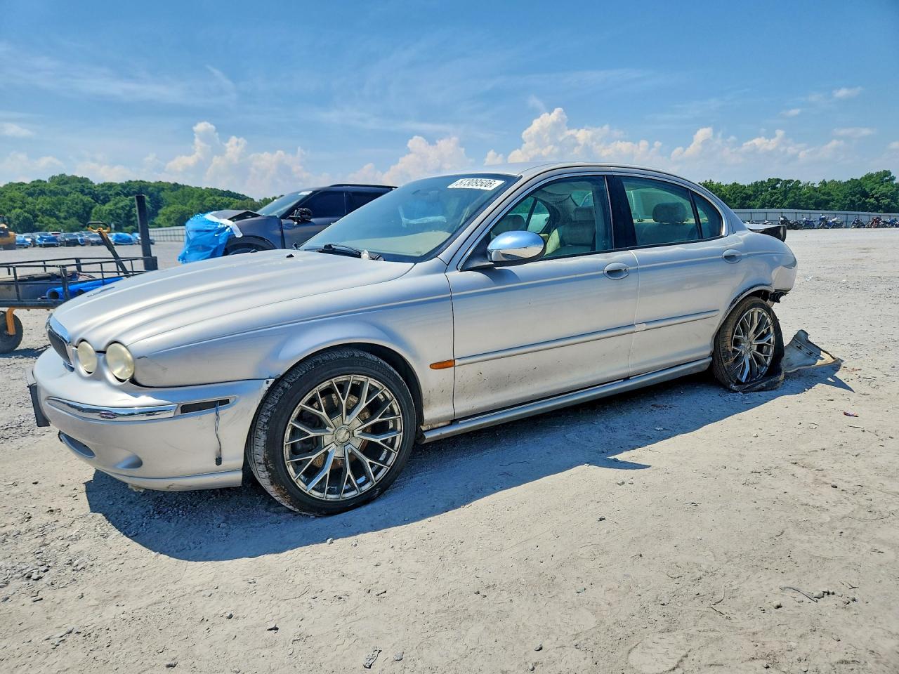 2002 Jaguar X-Type, VIN SAJEA51C32WC38972 — Rear end
