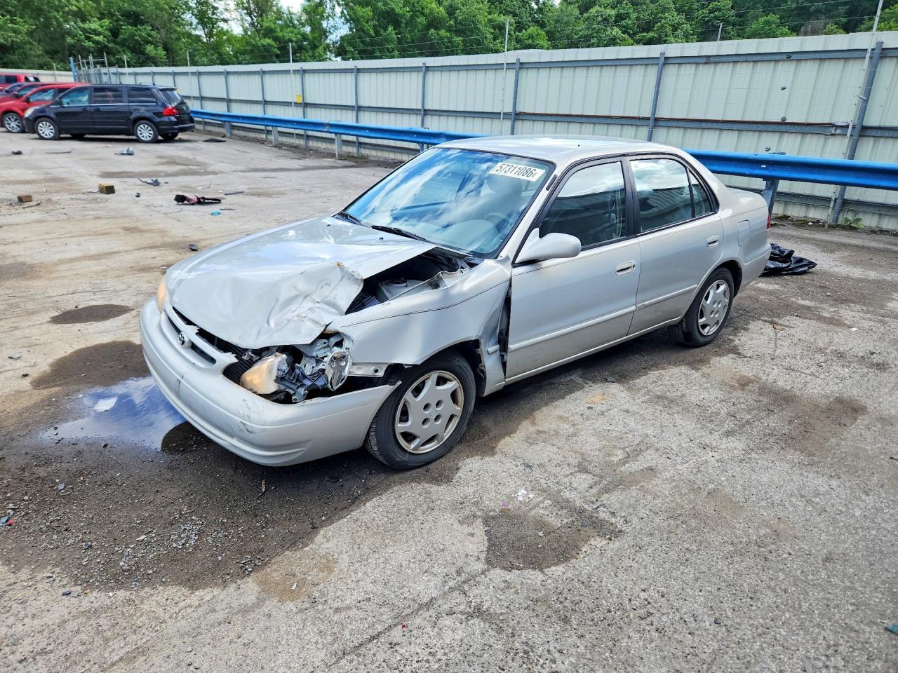 1999 Toyota Corolla CE, VIN 2T1BR12E2XC166128 — Front end