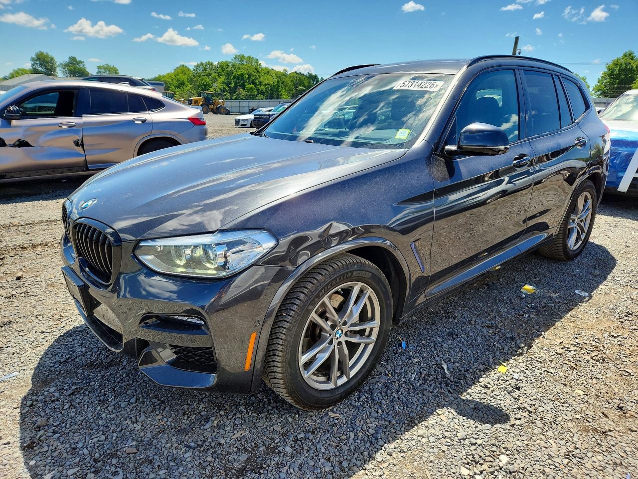 2021 BMW X3 xDrive30i, VIN 5UXTY5C03M9H28364 — Rear end