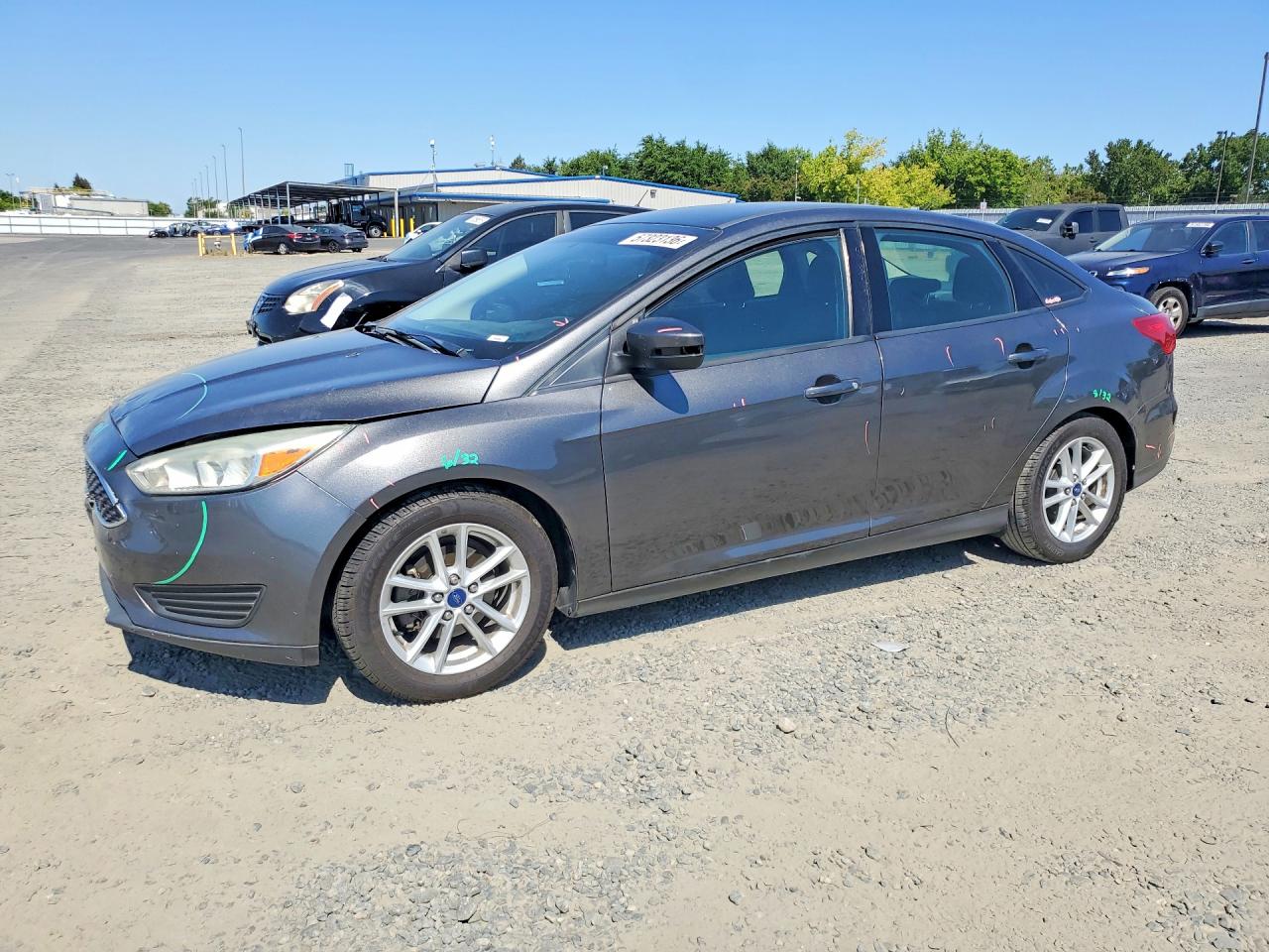 2015 Ford Focus SE, VIN 1FADP3F2XFL207029 — Front end