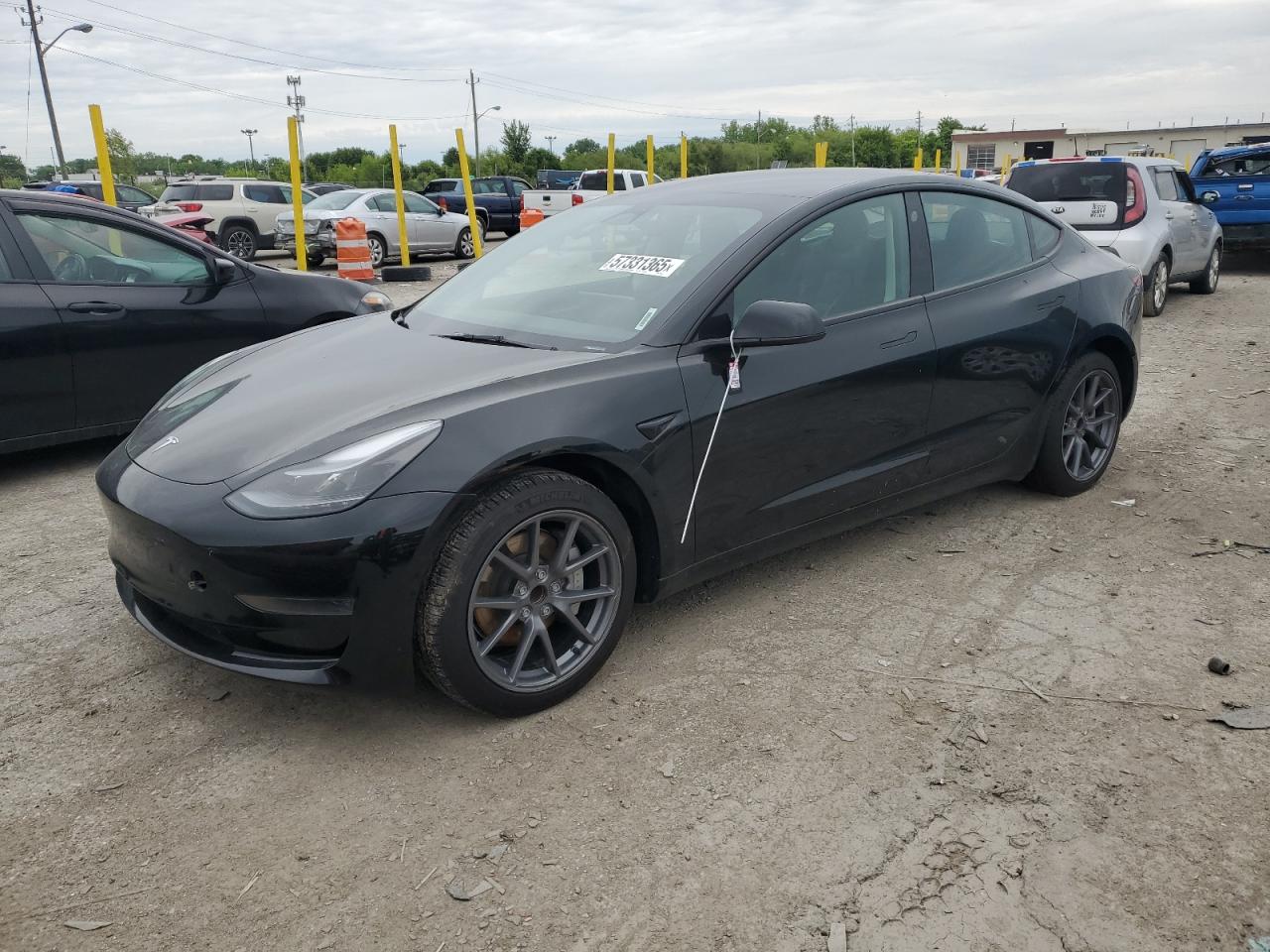 2023 Tesla Model 3, VIN 5YJ3E1EA7PF599058 — Minor dents and scratches