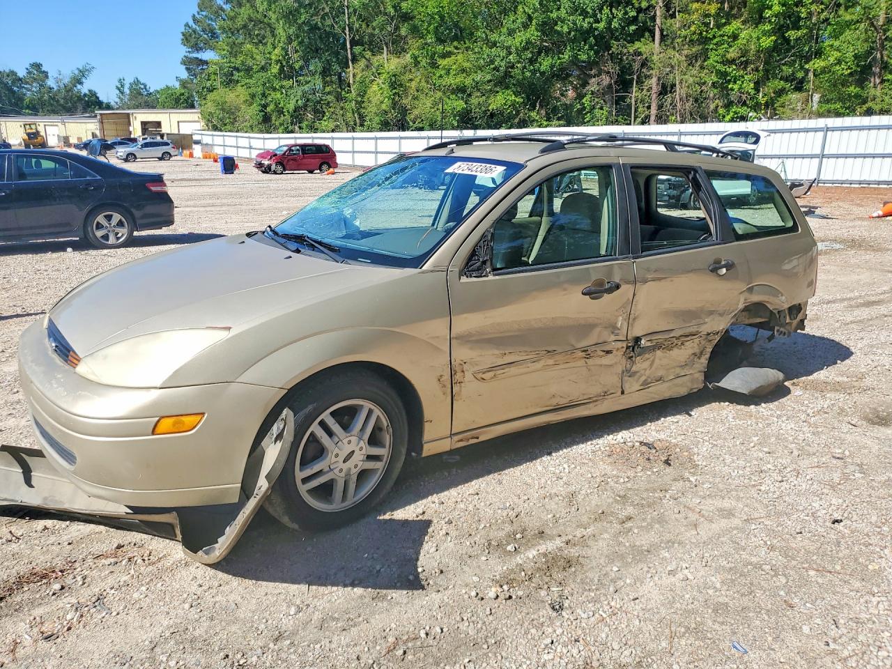 2000 Ford Focus SE, VIN 1FAFP36P6YW419576 — Бок