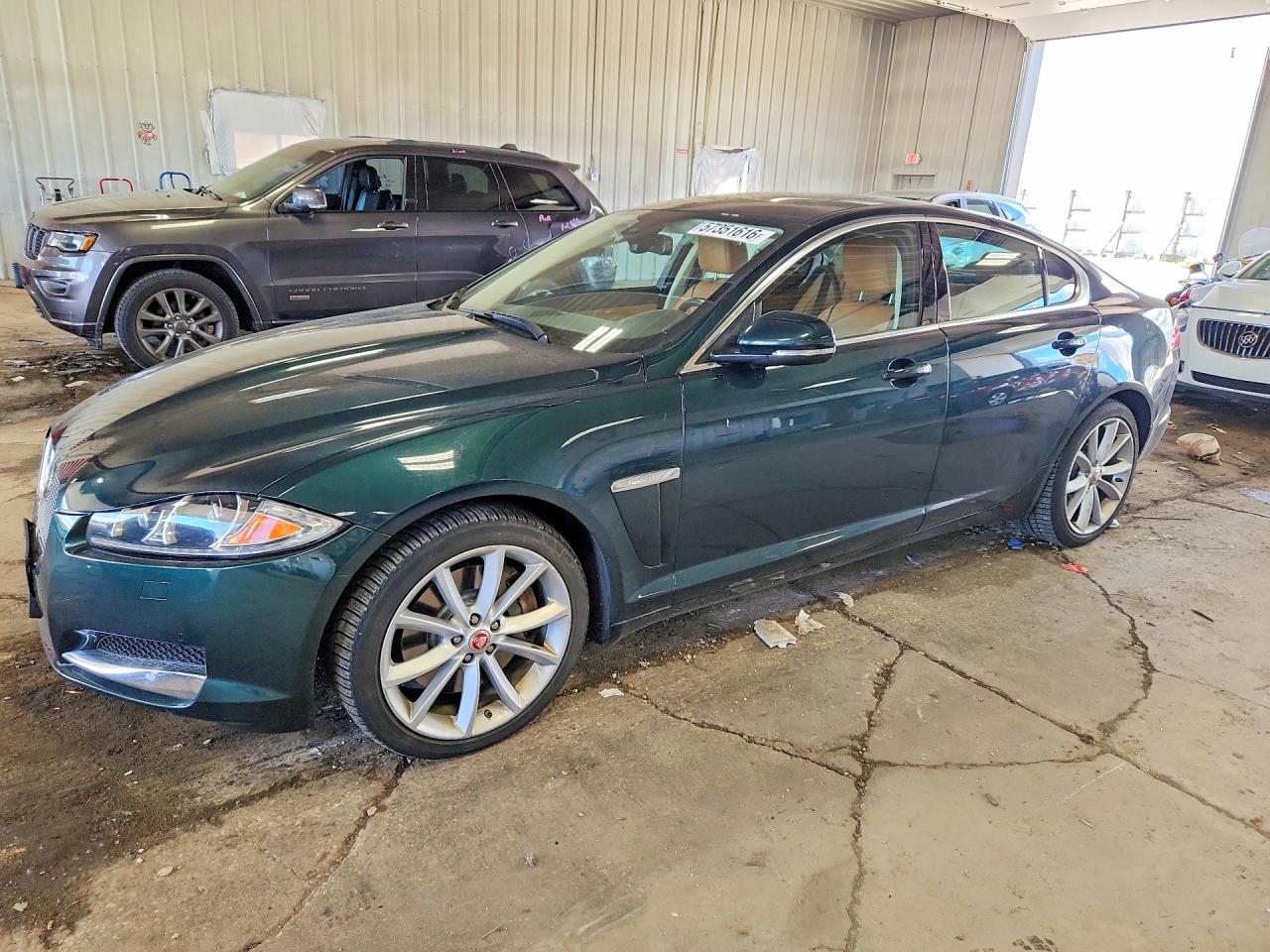 2015 Jaguar XF Portfolio, VIN SAJWJ0FF2F8U50618 — Side