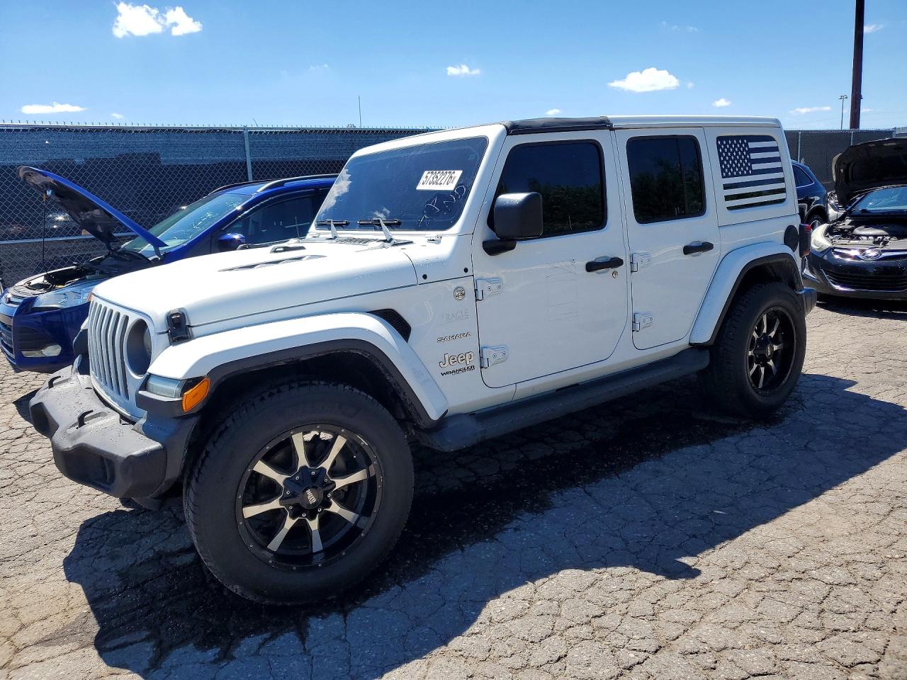 2018 Jeep Wrangler Unlimited Sport S, VIN 1C4HJXDG6JW110064 — Minor dents and scratches