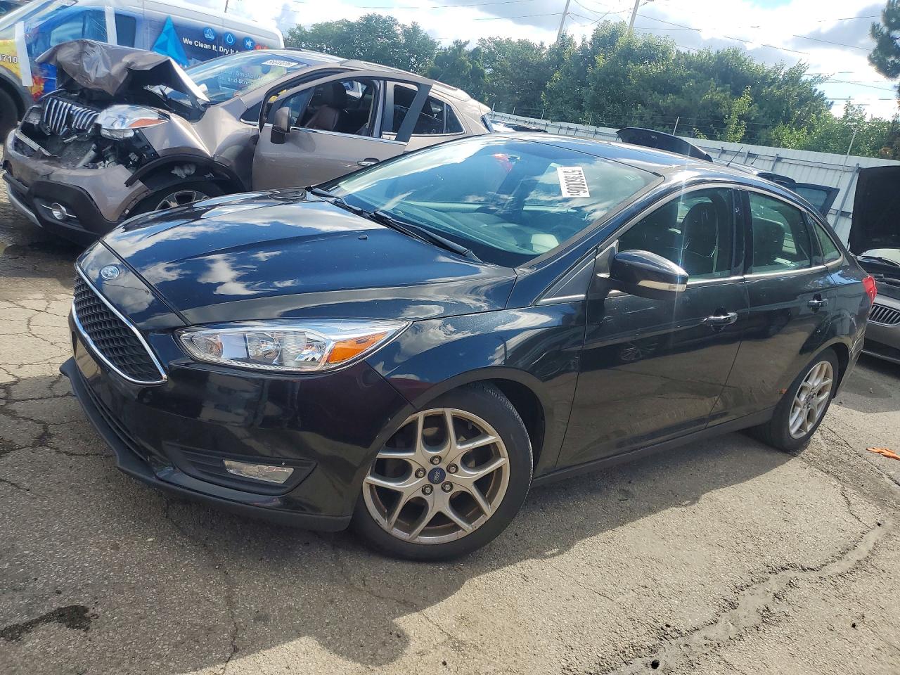 2015 Ford Focus SE, VIN 1FADP3F23FL270957 — Minor dents and scratches