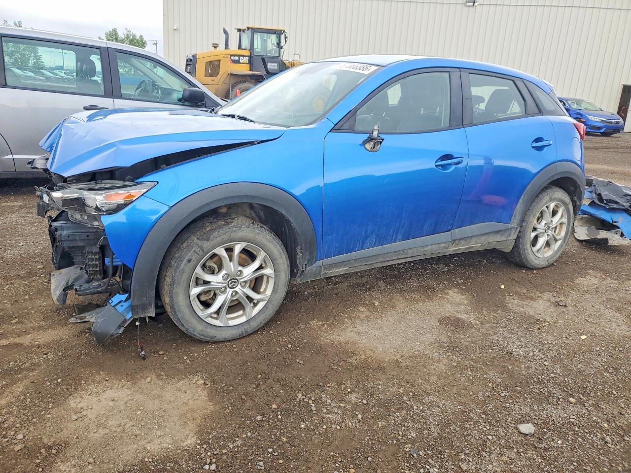 2016 Mazda CX-3 Touring, VIN JM1DKBC77G0103071 — Front end