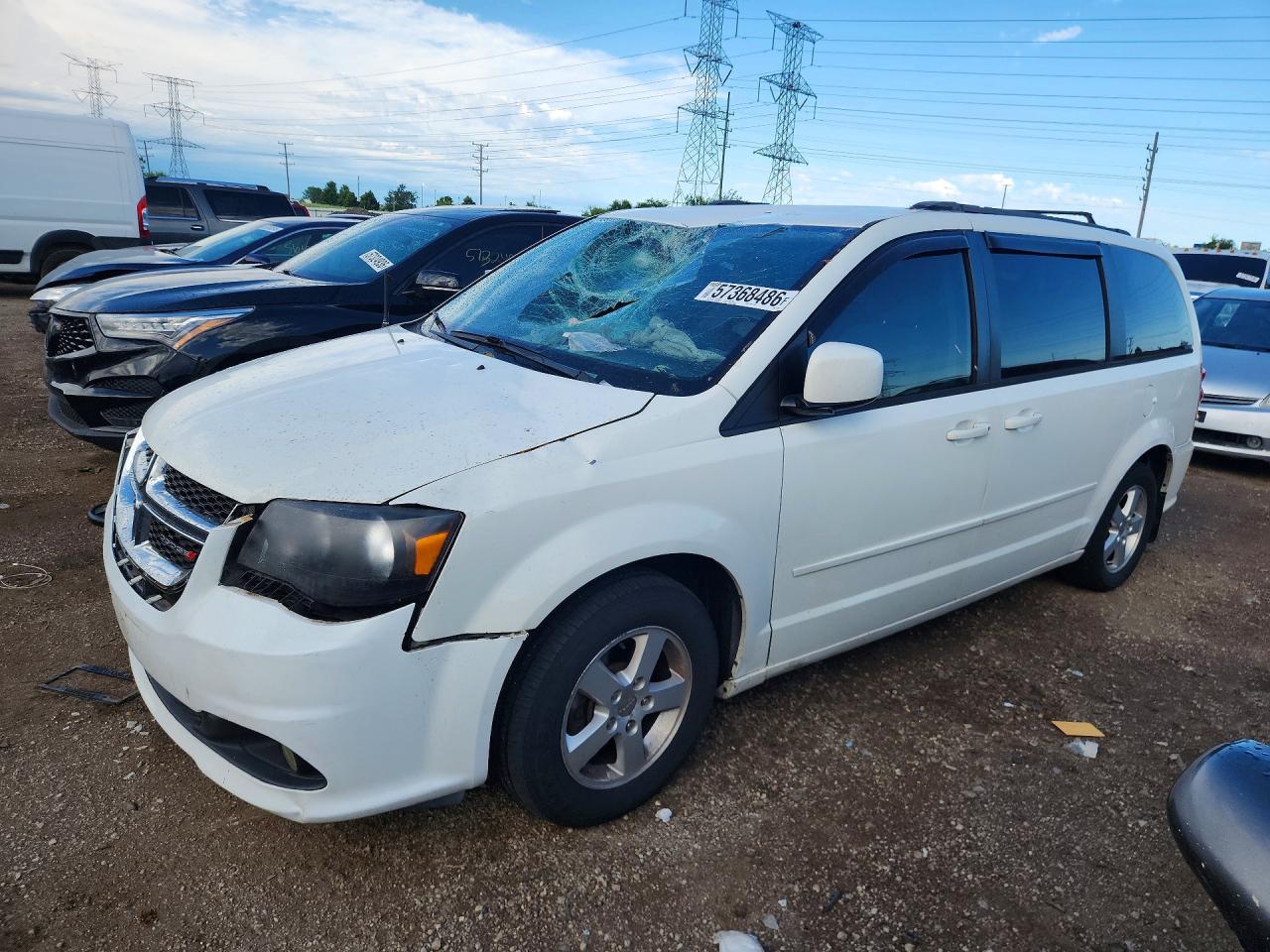 2011 Dodge Grand Caravan Mainstreet, VIN 2D4RN3DG2BR754837 — Front end