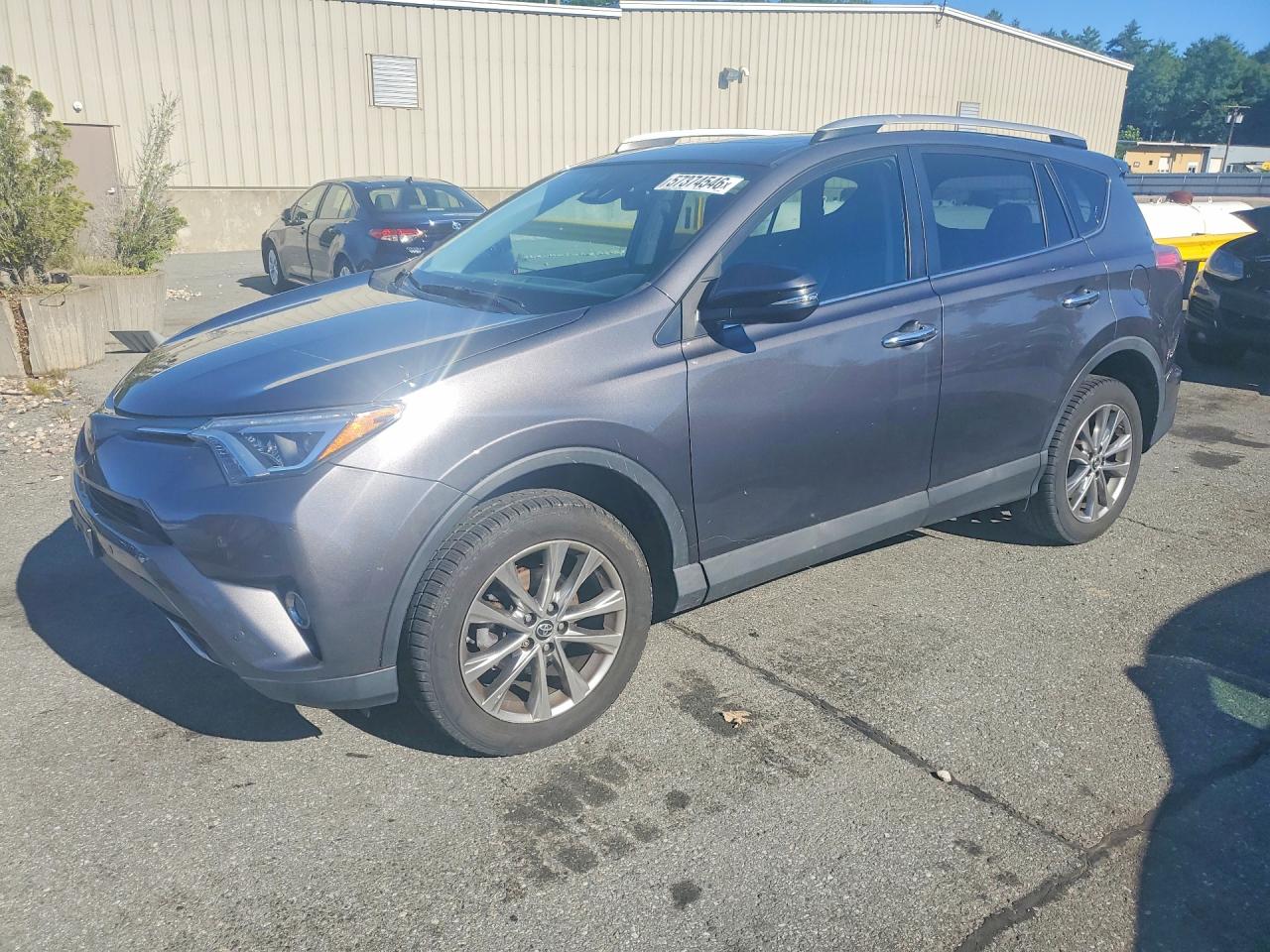 2016 Toyota RAV4 Limited, VIN 2T3DFREV6GW511520 — Side