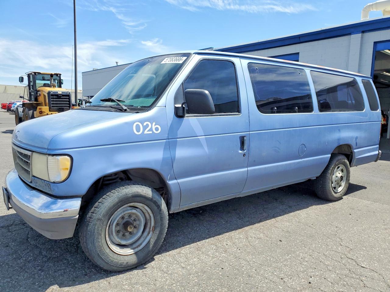 1995 Ford Econoline Wagon XL, VIN 1FBJS31H7SHC15064 — Side