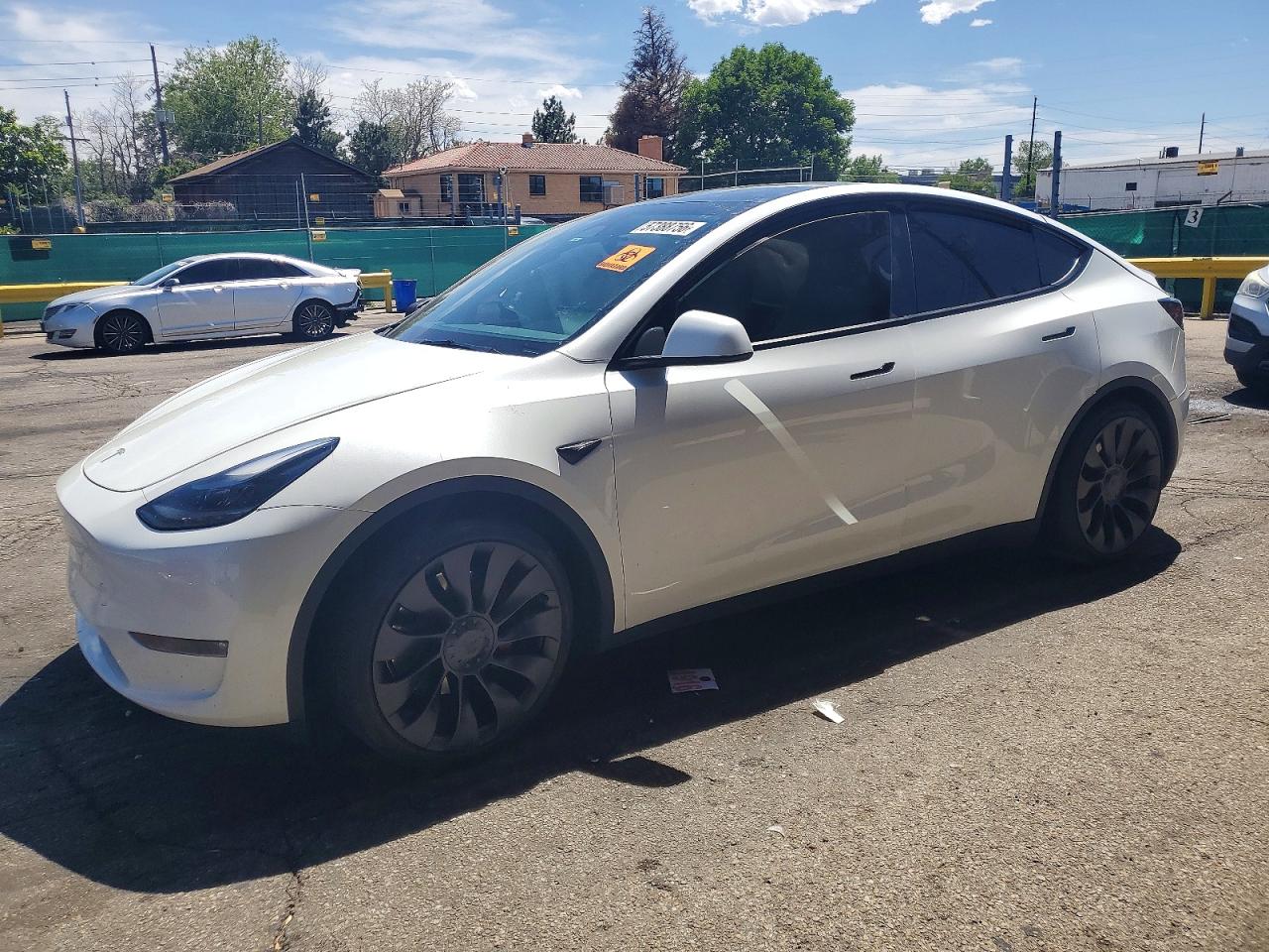2024 Tesla Model Y Performance, VIN 7SAYGDEF9RF083528 — Side