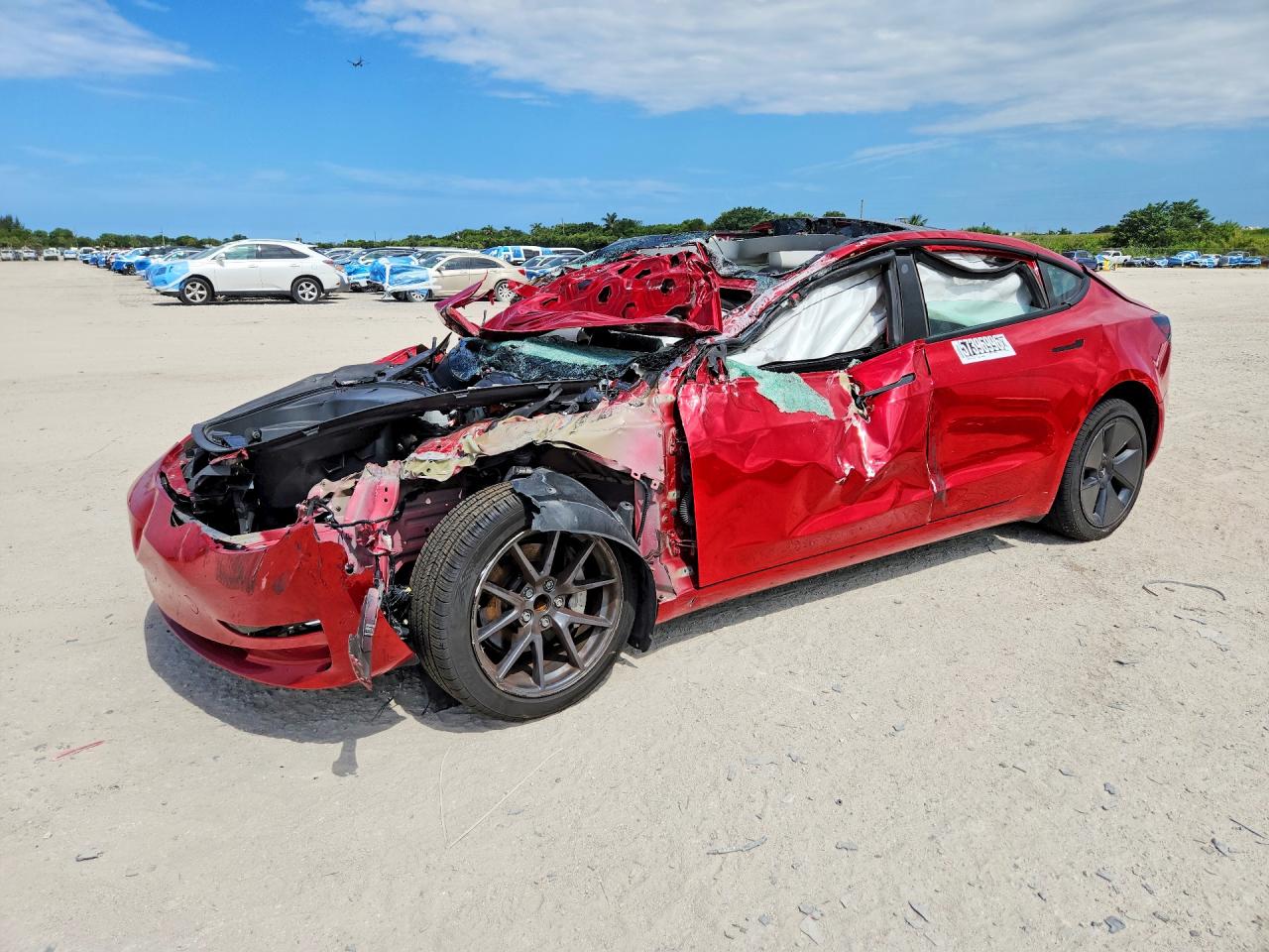 2023 Tesla Model 3, VIN 5YJ3E1EA9PF433754 — Опрокидывание