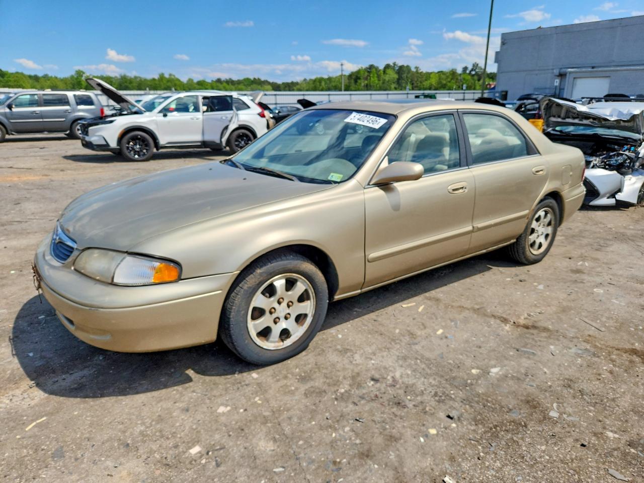 1999 Mazda 626 LX, VIN 1YVGF22D7X5871641 — Front end
