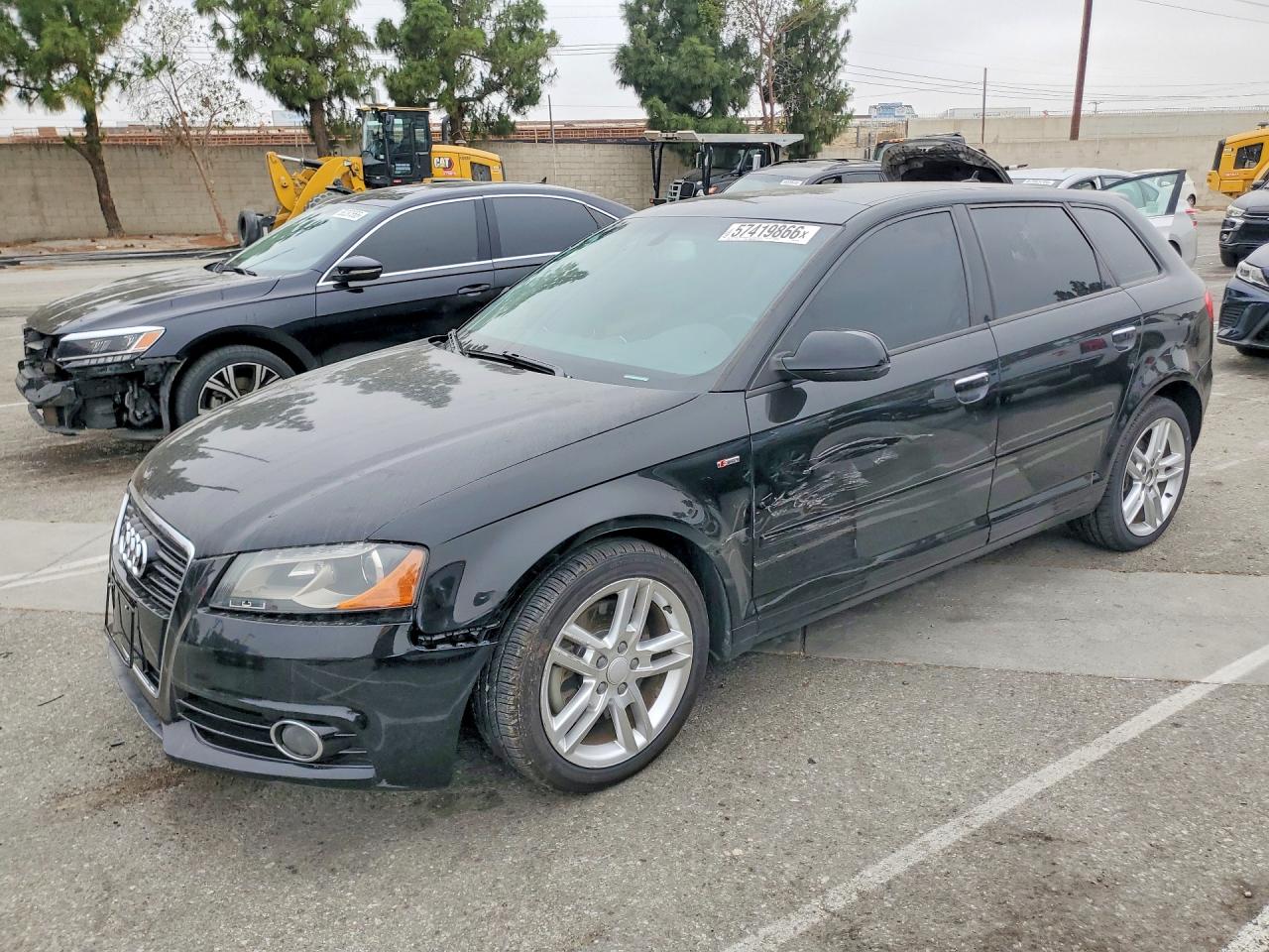 2011 Audi A3 Premium Plus, VIN WAUKEAFM8BA081396 — Side
