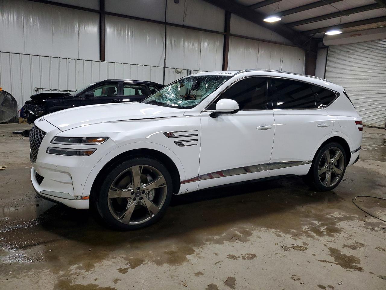 2023 Genesis GV80 3.5T Prestige, VIN KMUHCESC2PU111695 — Side