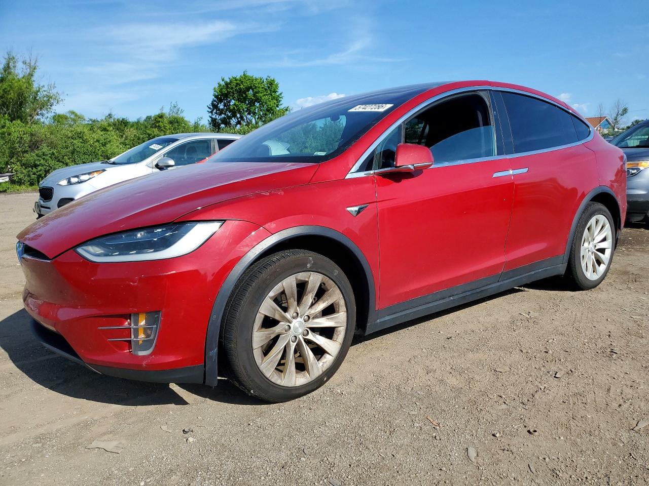 2019 Tesla Model X 75D, VIN 5YJXCBE25KF197361 — Hail