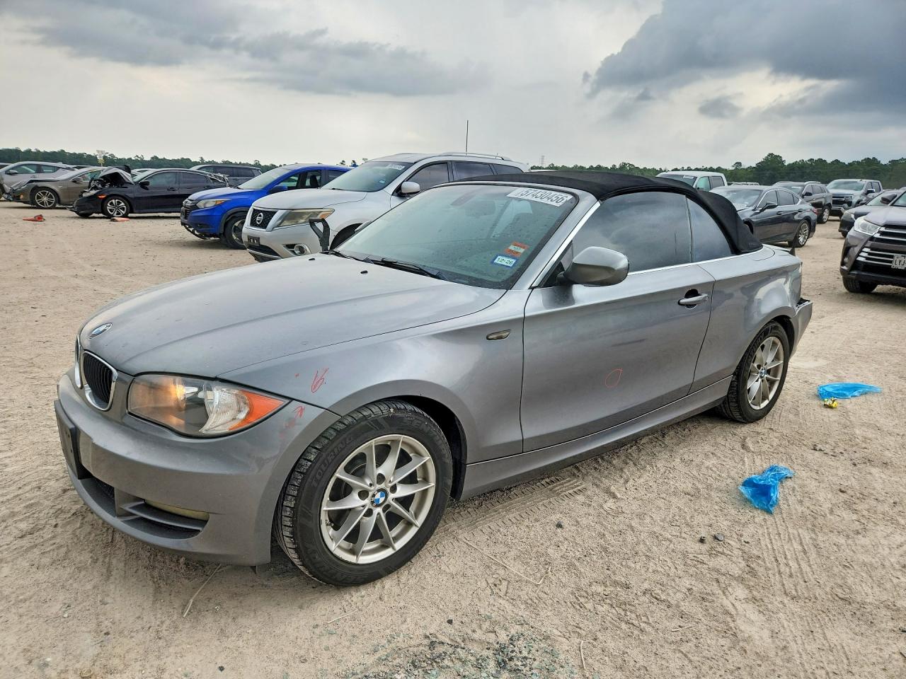 2011 BMW 1 Series 128i, VIN WBAUN1C51BVH83299 — Rear end