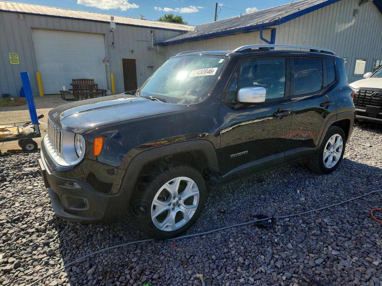 2015 Jeep Renegade Limited, VIN ZACCJBDTXFPC41934 — Side