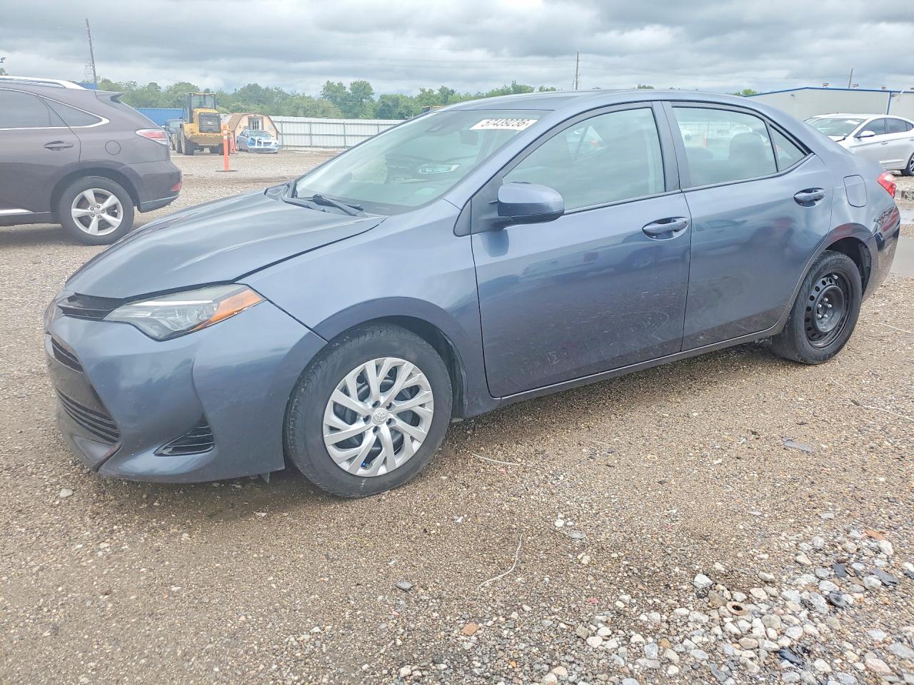 2019 Toyota Corolla LE, VIN 5YFBURHE1KP893323 — Side