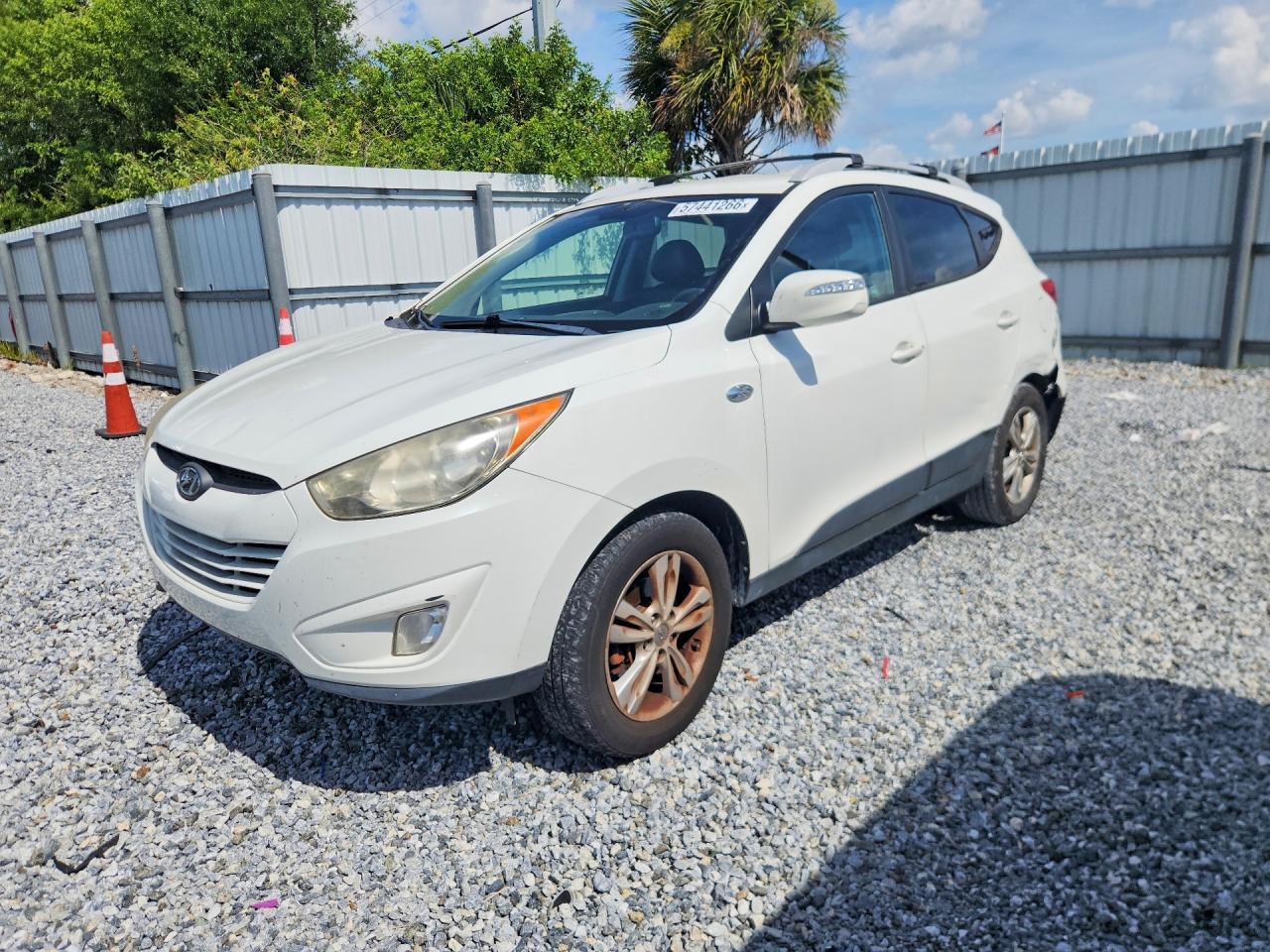 2013 Hyundai Tucson GLS, VIN KM8JU3AC2DU617333 — Rear end