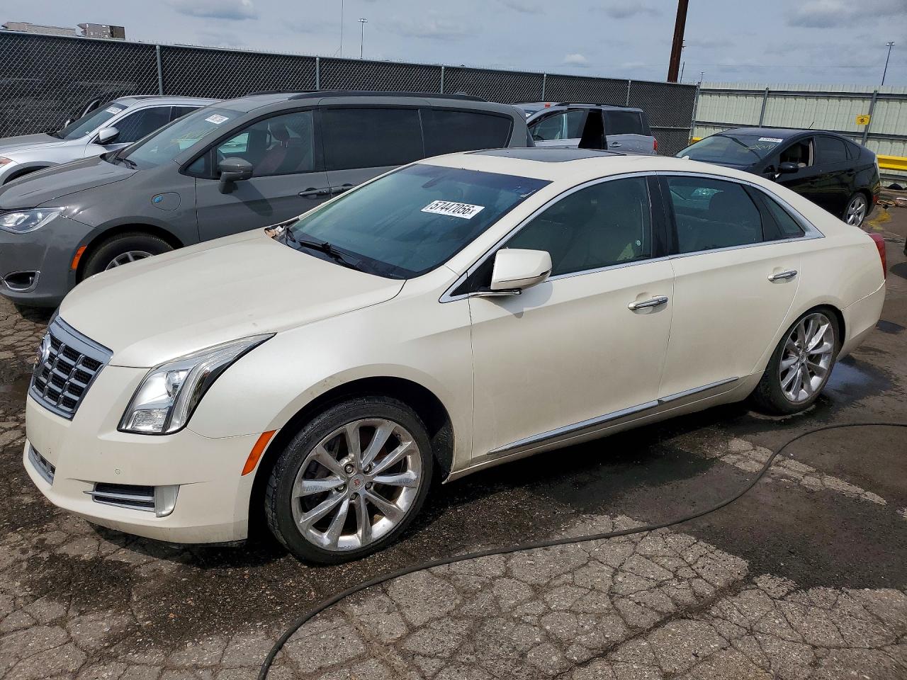 2013 Cadillac XTS Luxury, VIN 2G61P5S36D9115012 — Auction photo