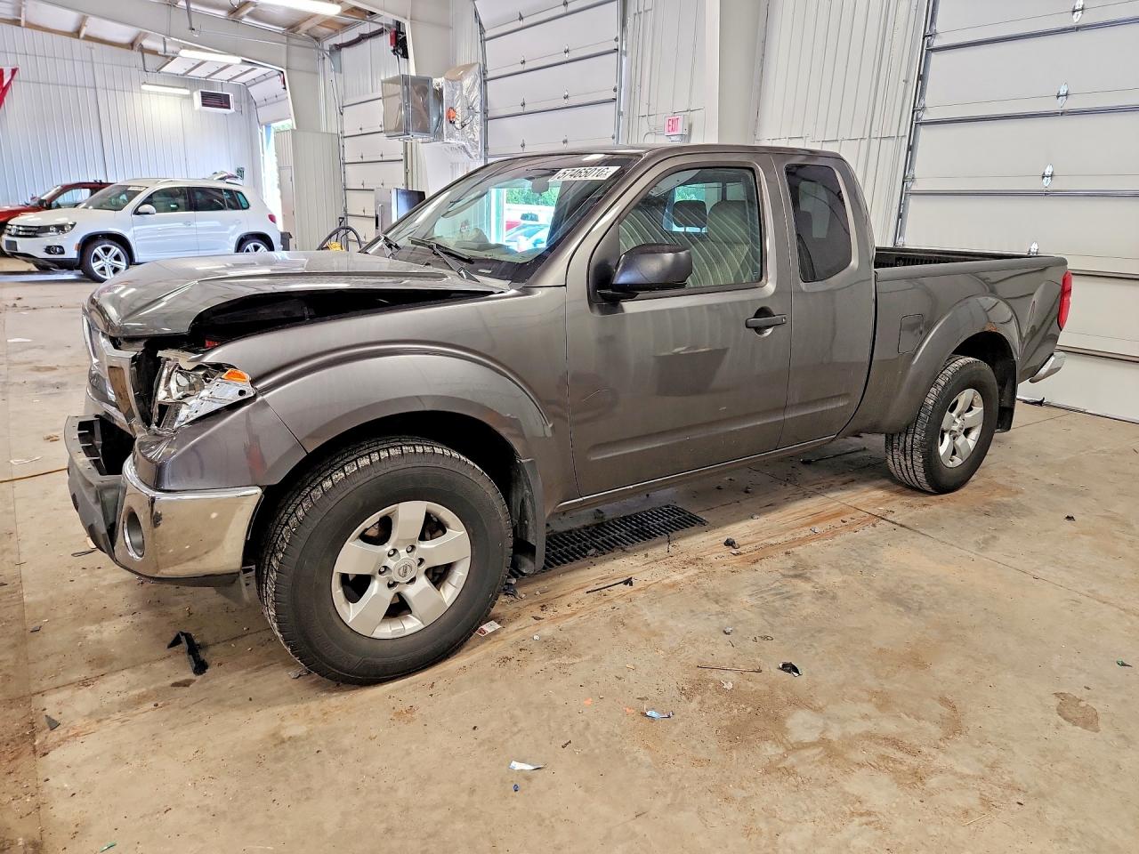 2009 Nissan Frontier SE, VIN 1N6AD06W79C409660 — Перед