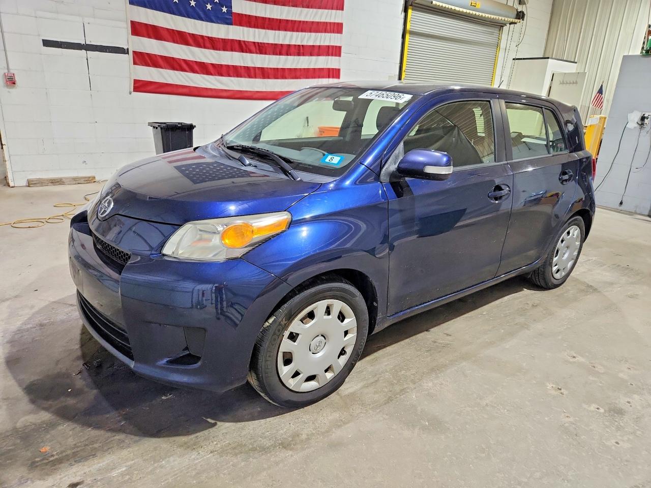 2014 Scion xD, VIN JTKKUPB40E1044290 — Side