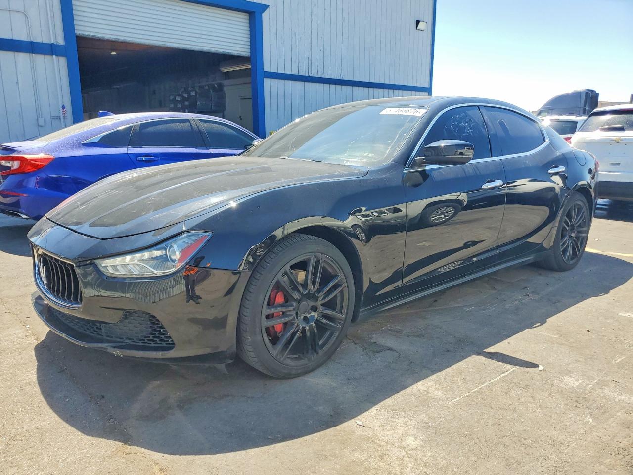 2017 Maserati Ghibli, VIN ZAM57XSA4H1205953 — Зад
